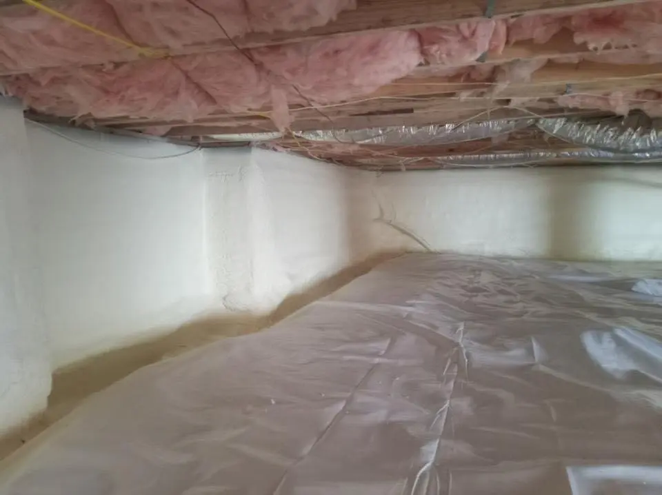 Crawl space encapsulation with closed-cell spray foam for Commercial Roof Restoration in Dalton